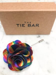 The Kimpton Gray Chicago has collaborated with Tie Bar for a Pride Month lapel pin.